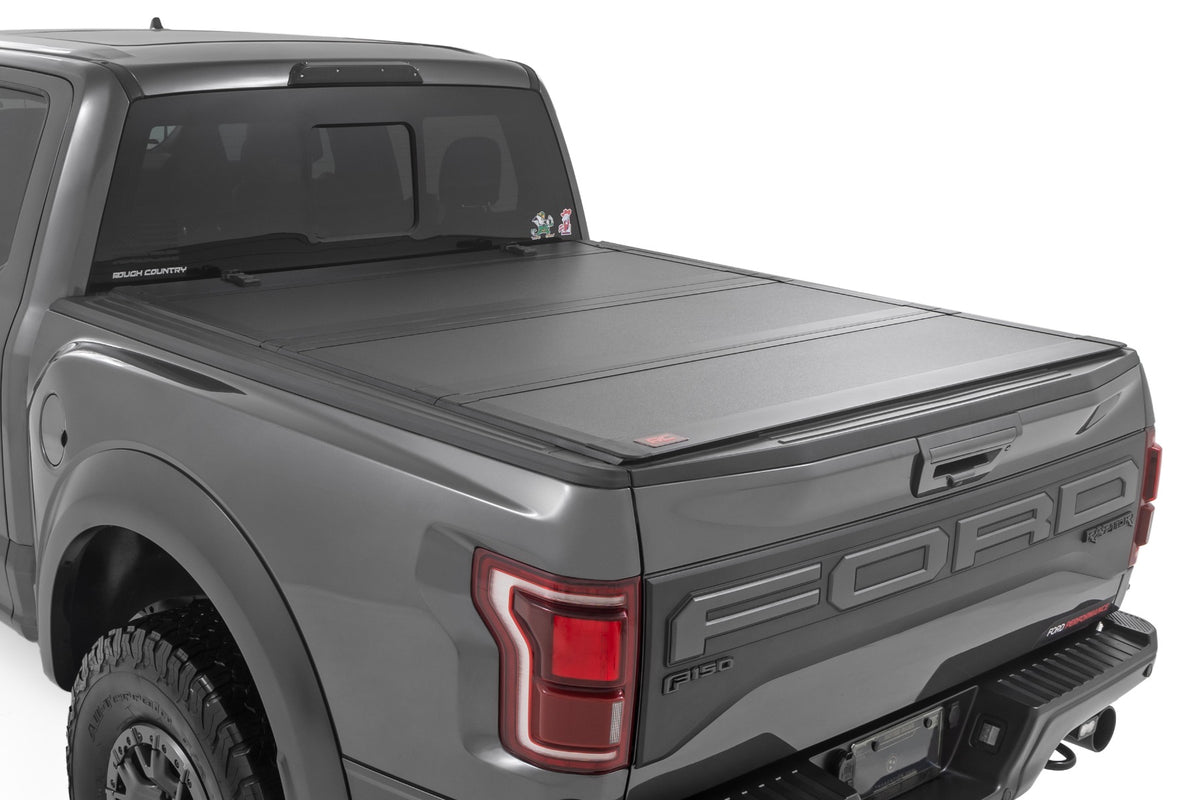 Rough Country Rough Country Hard Tri-Fold Flip Up Bed Cover  5 7 Bed  Ford F-150 (21-26) F-150 Lightning (22-26) 49221550 | 49221550